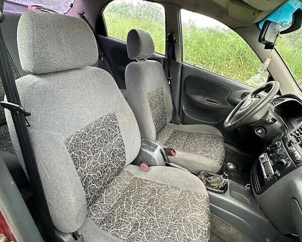 Красный Дэу Ланос, объемом двигателя 1.5 л и пробегом 150 тыс. км за 1250 $, фото 18 на Automoto.ua