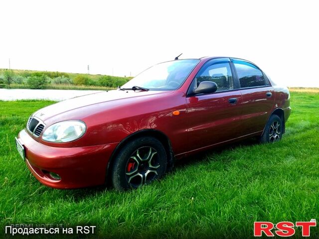 Красный Дэу Ланос, объемом двигателя 1.6 л и пробегом 188 тыс. км за 2350 $, фото 1 на Automoto.ua