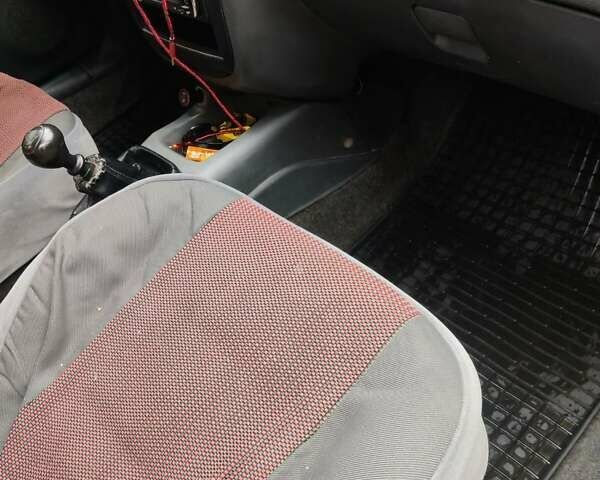 Красный Дэу Ланос, объемом двигателя 1.5 л и пробегом 275 тыс. км за 1700 $, фото 9 на Automoto.ua