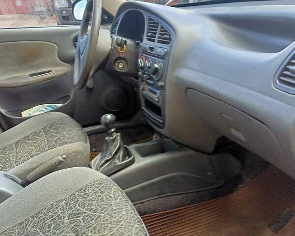 Червоний Деу Ланос, об'ємом двигуна 1.5 л та пробігом 268 тис. км за 1950 $, фото 21 на Automoto.ua