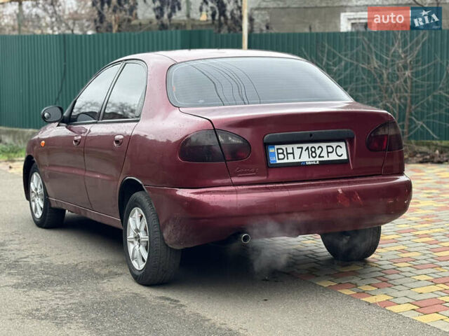 Красный Дэу Ланос, объемом двигателя 1.5 л и пробегом 270 тыс. км за 1400 $, фото 3 на Automoto.ua