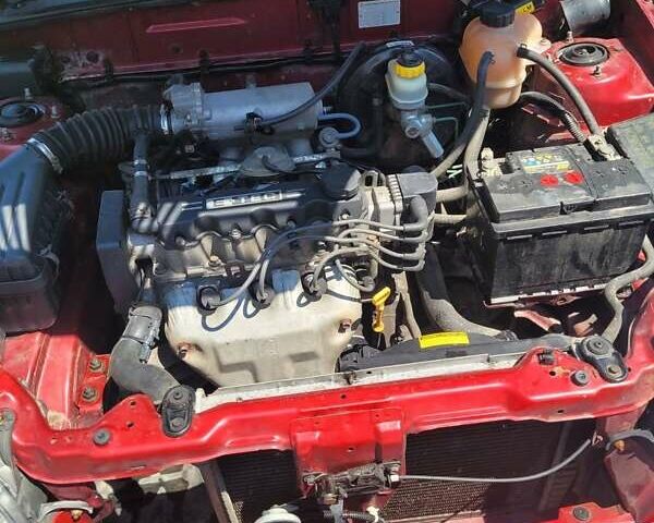 Червоний Деу Ланос, об'ємом двигуна 1.5 л та пробігом 145 тис. км за 1850 $, фото 4 на Automoto.ua