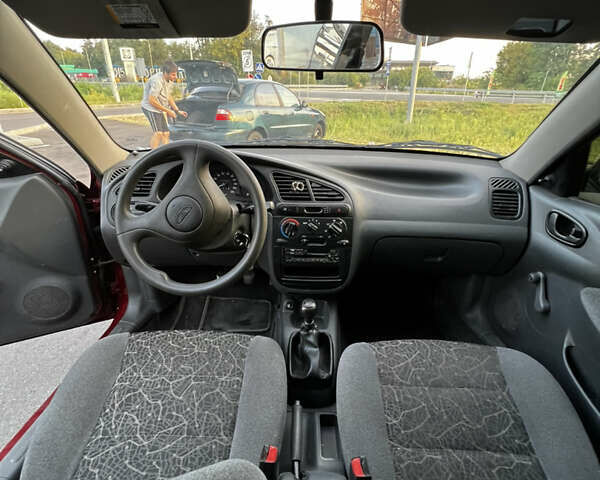 Красный Дэу Ланос, объемом двигателя 1.5 л и пробегом 175 тыс. км за 2200 $, фото 14 на Automoto.ua