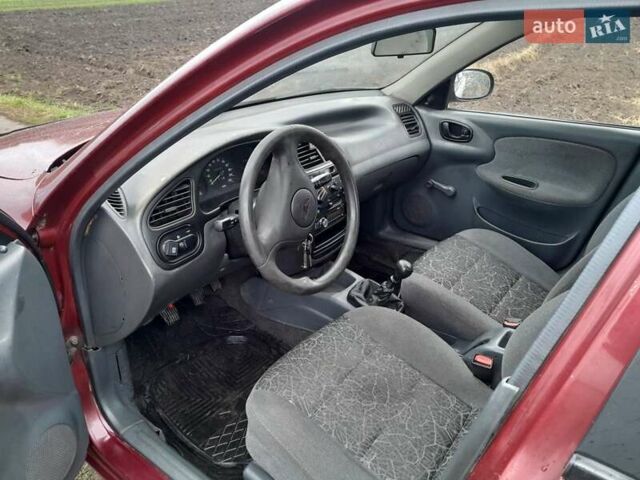 Красный Дэу Ланос, объемом двигателя 1.5 л и пробегом 163 тыс. км за 2200 $, фото 2 на Automoto.ua