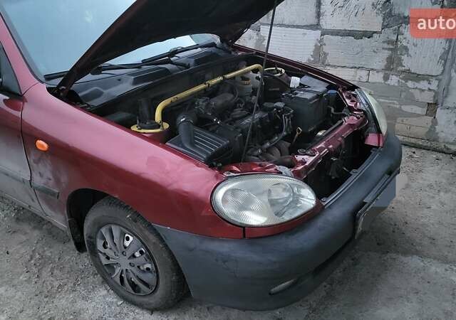 Красный Дэу Ланос, объемом двигателя 1.5 л и пробегом 305 тыс. км за 1800 $, фото 7 на Automoto.ua