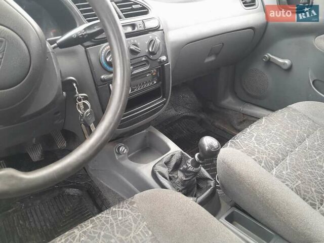 Красный Дэу Ланос, объемом двигателя 1.5 л и пробегом 163 тыс. км за 2200 $, фото 7 на Automoto.ua