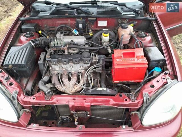 Красный Дэу Ланос, объемом двигателя 1.5 л и пробегом 163 тыс. км за 2200 $, фото 5 на Automoto.ua