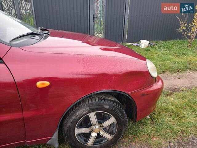 Красный Дэу Ланос, объемом двигателя 1.5 л и пробегом 289 тыс. км за 1700 $, фото 3 на Automoto.ua