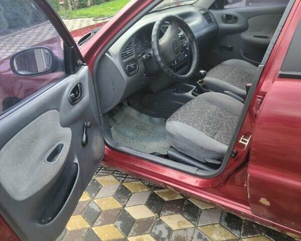Червоний Деу Ланос, об'ємом двигуна 1.5 л та пробігом 224 тис. км за 1400 $, фото 4 на Automoto.ua