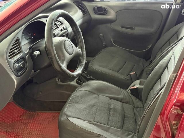 Красный Дэу Ланос, объемом двигателя 1.5 л и пробегом 305 тыс. км за 2440 $, фото 8 на Automoto.ua