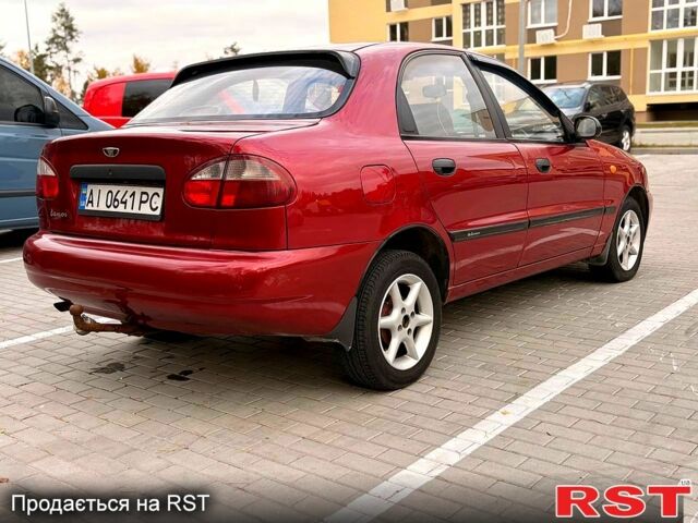 Красный Дэу Ланос, объемом двигателя 1.5 л и пробегом 260 тыс. км за 1999 $, фото 7 на Automoto.ua