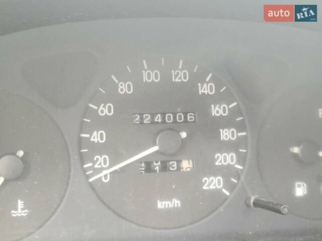 Червоний Деу Ланос, об'ємом двигуна 1.5 л та пробігом 224 тис. км за 1400 $, фото 6 на Automoto.ua