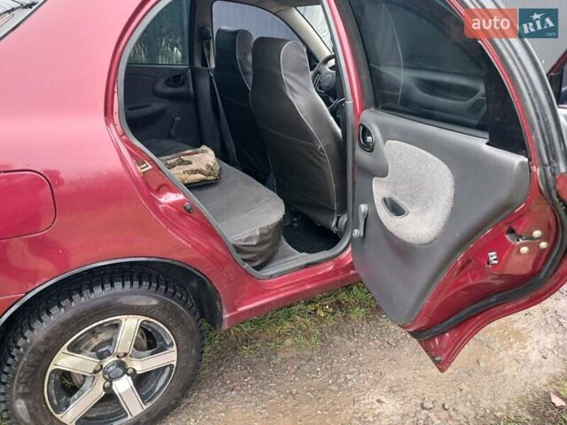Красный Дэу Ланос, объемом двигателя 1.5 л и пробегом 289 тыс. км за 1700 $, фото 8 на Automoto.ua