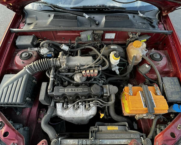 Красный Дэу Ланос, объемом двигателя 1.5 л и пробегом 175 тыс. км за 2200 $, фото 9 на Automoto.ua