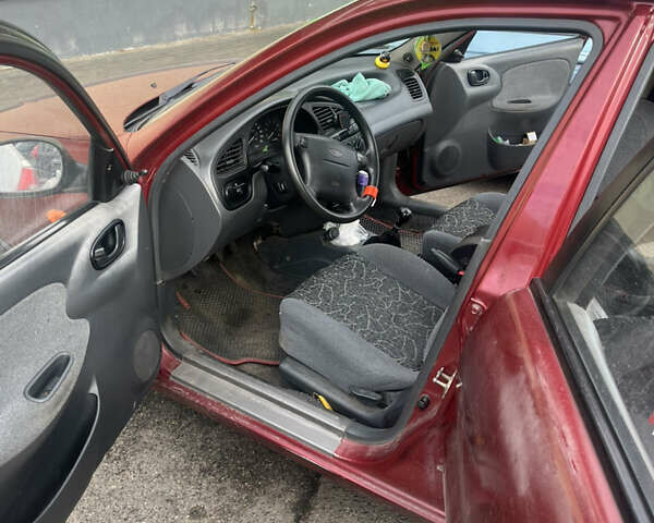 Деу Ланос 2007 у Черкасах на Automoto.ua Червоний Деу Ланос, об'ємом двигуна 1.6 л та пробігом 311 тис. км за 2575 $, фото 9 на Automoto.ua