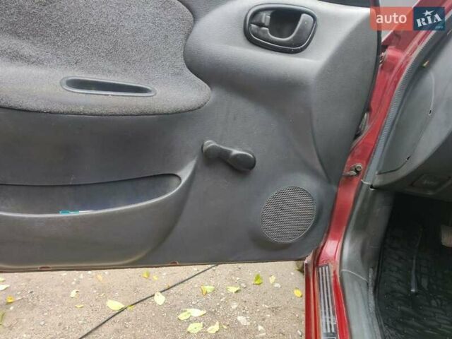 Красный Дэу Ланос, объемом двигателя 1.5 л и пробегом 275 тыс. км за 1700 $, фото 4 на Automoto.ua