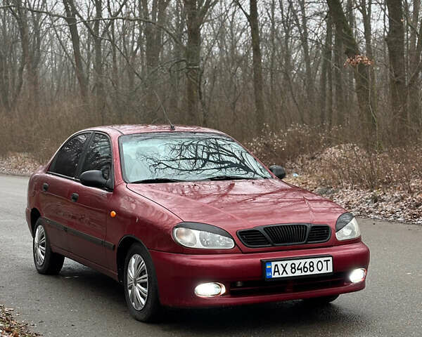 Красный Дэу Ланос, объемом двигателя 1.6 л и пробегом 235 тыс. км за 2150 $, фото 2 на Automoto.ua