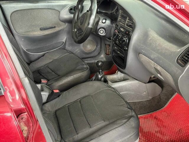 Красный Дэу Ланос, объемом двигателя 1.5 л и пробегом 305 тыс. км за 2440 $, фото 11 на Automoto.ua
