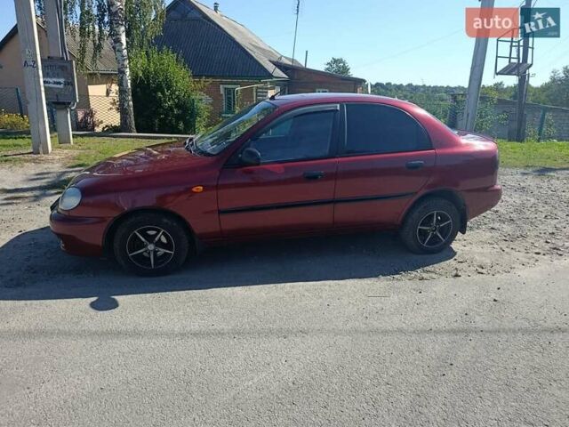 Красный Дэу Ланос, объемом двигателя 1.5 л и пробегом 330 тыс. км за 2550 $, фото 4 на Automoto.ua