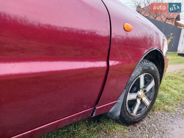 Красный Дэу Ланос, объемом двигателя 1.5 л и пробегом 289 тыс. км за 1700 $, фото 2 на Automoto.ua