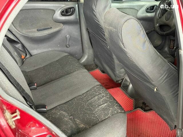 Красный Дэу Ланос, объемом двигателя 1.5 л и пробегом 305 тыс. км за 2440 $, фото 12 на Automoto.ua