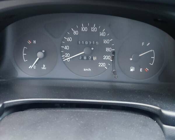 Красный Дэу Ланос, объемом двигателя 1.5 л и пробегом 120 тыс. км за 2900 $, фото 7 на Automoto.ua