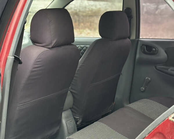 Красный Дэу Ланос, объемом двигателя 1.6 л и пробегом 235 тыс. км за 2150 $, фото 9 на Automoto.ua