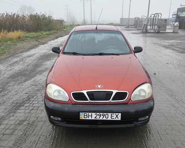 Красный Дэу Ланос, объемом двигателя 1.5 л и пробегом 305 тыс. км за 1800 $, фото 2 на Automoto.ua