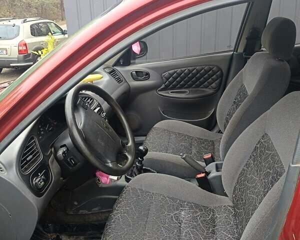 Деу Ланос 2007 у Краматорске на Automoto.ua Червоний Деу Ланос, об'ємом двигуна 1.6 л та пробігом 318 тис. км за 2500 $, фото 1 на Automoto.ua