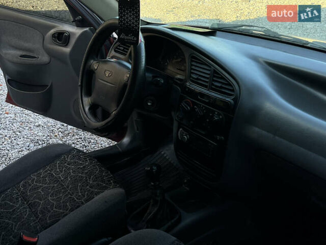 Червоний Деу Ланос, об'ємом двигуна 1.6 л та пробігом 495 тис. км за 2600 $, фото 18 на Automoto.ua