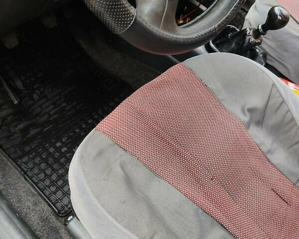 Красный Дэу Ланос, объемом двигателя 1.5 л и пробегом 275 тыс. км за 1700 $, фото 3 на Automoto.ua