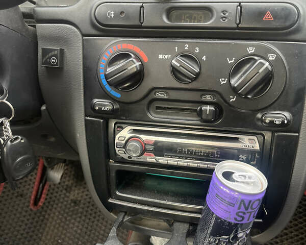 Деу Ланос 2007 у Черкасах на Automoto.ua Червоний Деу Ланос, об'ємом двигуна 1.6 л та пробігом 311 тис. км за 2575 $, фото 7 на Automoto.ua