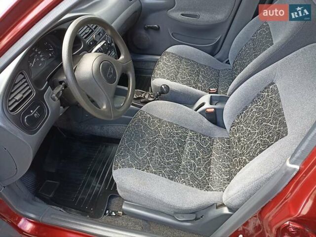 Красный Дэу Ланос, объемом двигателя 1.5 л и пробегом 174 тыс. км за 2650 $, фото 12 на Automoto.ua