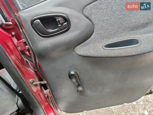 Красный Дэу Ланос, объемом двигателя 1.5 л и пробегом 275 тыс. км за 1700 $, фото 14 на Automoto.ua