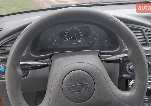 Красный Дэу Ланос, объемом двигателя 1.5 л и пробегом 230 тыс. км за 2600 $, фото 9 на Automoto.ua