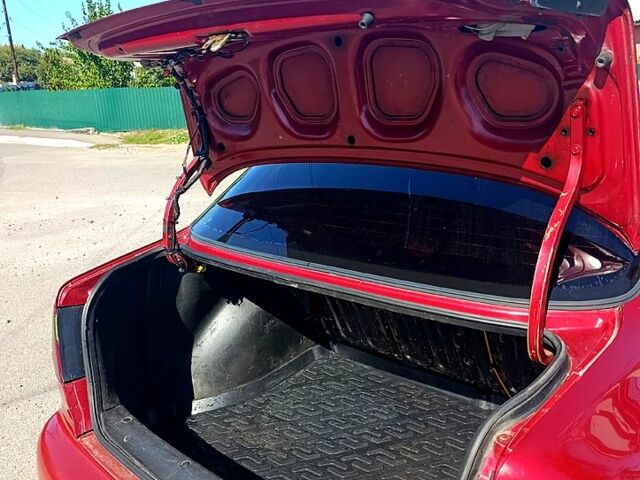 Червоний Деу Ланос, об'ємом двигуна 1.5 л та пробігом 313 тис. км за 2480 $, фото 1 на Automoto.ua