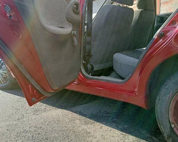 Червоний Деу Ланос, об'ємом двигуна 1.5 л та пробігом 268 тис. км за 1950 $, фото 12 на Automoto.ua