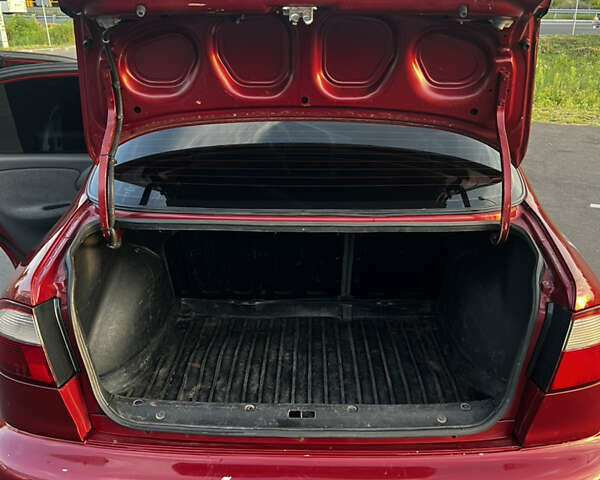 Красный Дэу Ланос, объемом двигателя 1.5 л и пробегом 175 тыс. км за 2200 $, фото 19 на Automoto.ua