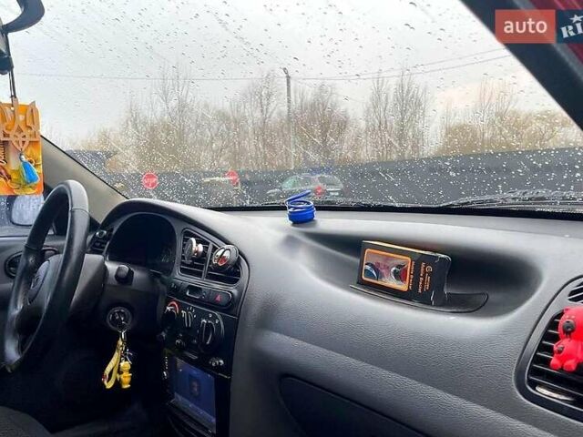 Красный Дэу Ланос, объемом двигателя 1.5 л и пробегом 193 тыс. км за 2600 $, фото 4 на Automoto.ua