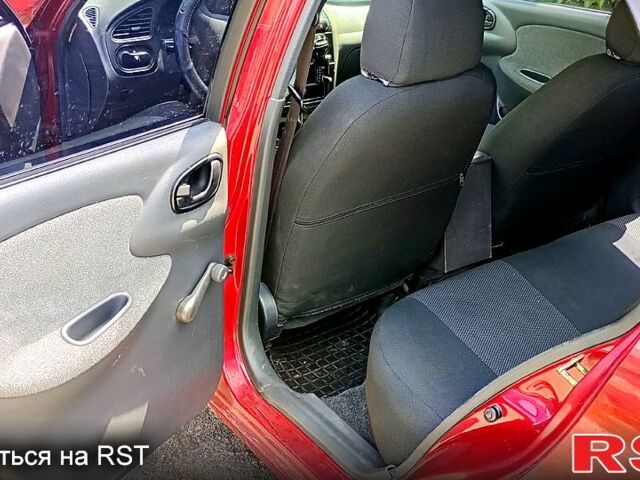 Червоний Деу Ланос, об'ємом двигуна 1.5 л та пробігом 350 тис. км за 1200 $, фото 4 на Automoto.ua