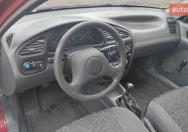 Красный Дэу Ланос, объемом двигателя 1.5 л и пробегом 230 тыс. км за 2600 $, фото 12 на Automoto.ua