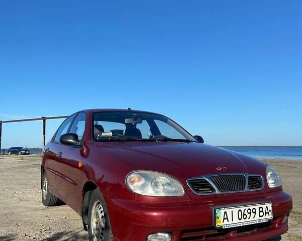 Красный Дэу Ланос, объемом двигателя 1.5 л и пробегом 209 тыс. км за 2500 $, фото 3 на Automoto.ua