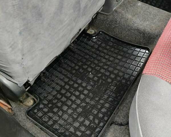 Красный Дэу Ланос, объемом двигателя 1.5 л и пробегом 275 тыс. км за 1700 $, фото 12 на Automoto.ua