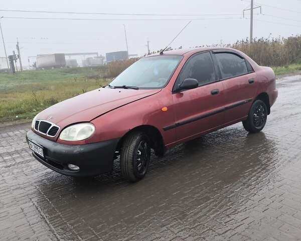 Красный Дэу Ланос, объемом двигателя 1.5 л и пробегом 305 тыс. км за 1800 $, фото 3 на Automoto.ua