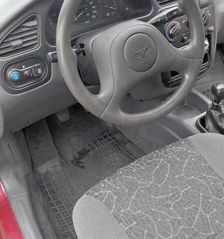 Красный Дэу Ланос, объемом двигателя 1.5 л и пробегом 230 тыс. км за 2600 $, фото 10 на Automoto.ua