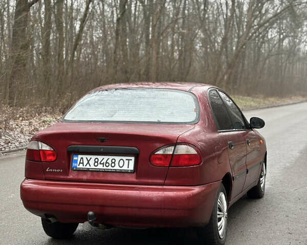 Красный Дэу Ланос, объемом двигателя 1.6 л и пробегом 235 тыс. км за 2150 $, фото 3 на Automoto.ua