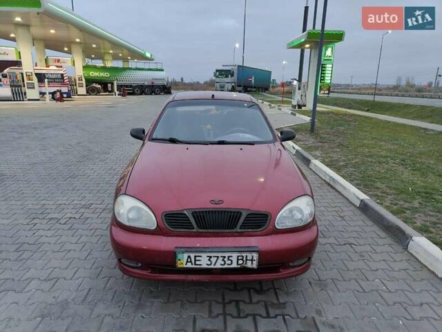 Красный Дэу Ланос, объемом двигателя 1.5 л и пробегом 275 тыс. км за 1700 $, фото 2 на Automoto.ua