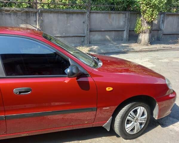 Красный Дэу Ланос, объемом двигателя 1.5 л и пробегом 123 тыс. км за 3100 $, фото 3 на Automoto.ua