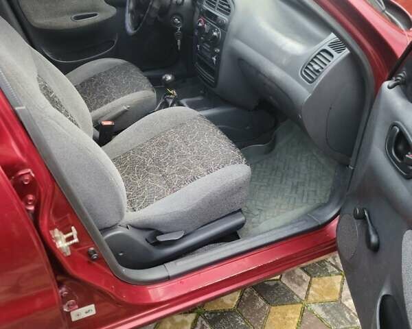 Червоний Деу Ланос, об'ємом двигуна 1.5 л та пробігом 224 тис. км за 1400 $, фото 5 на Automoto.ua