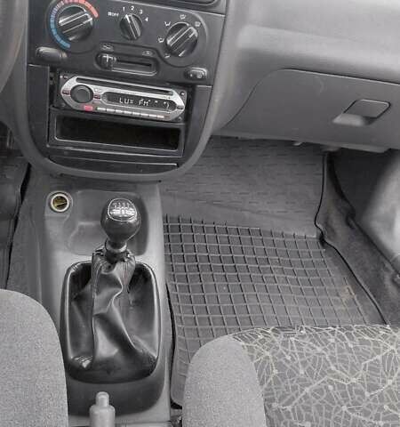 Красный Дэу Ланос, объемом двигателя 1.5 л и пробегом 230 тыс. км за 2600 $, фото 14 на Automoto.ua